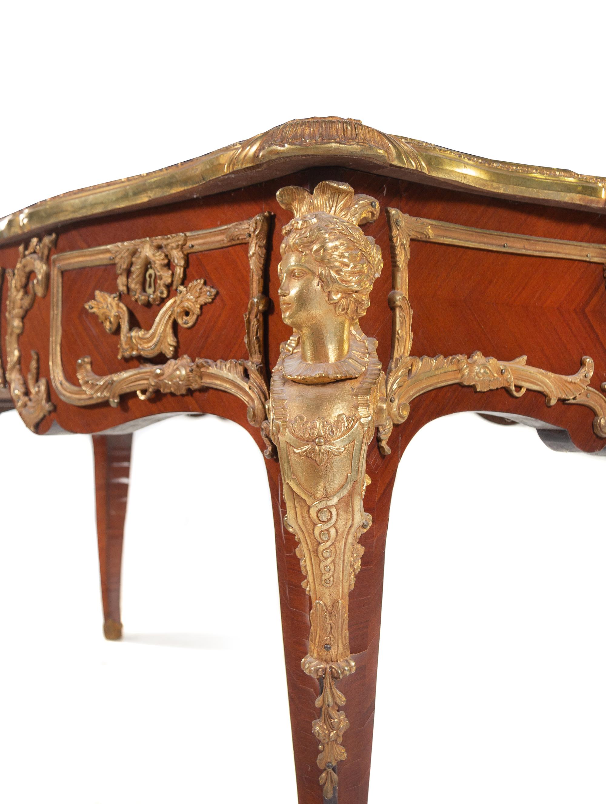 A Louis XV Style Gilt Bronze Mounted Mahogany Bureau Plat