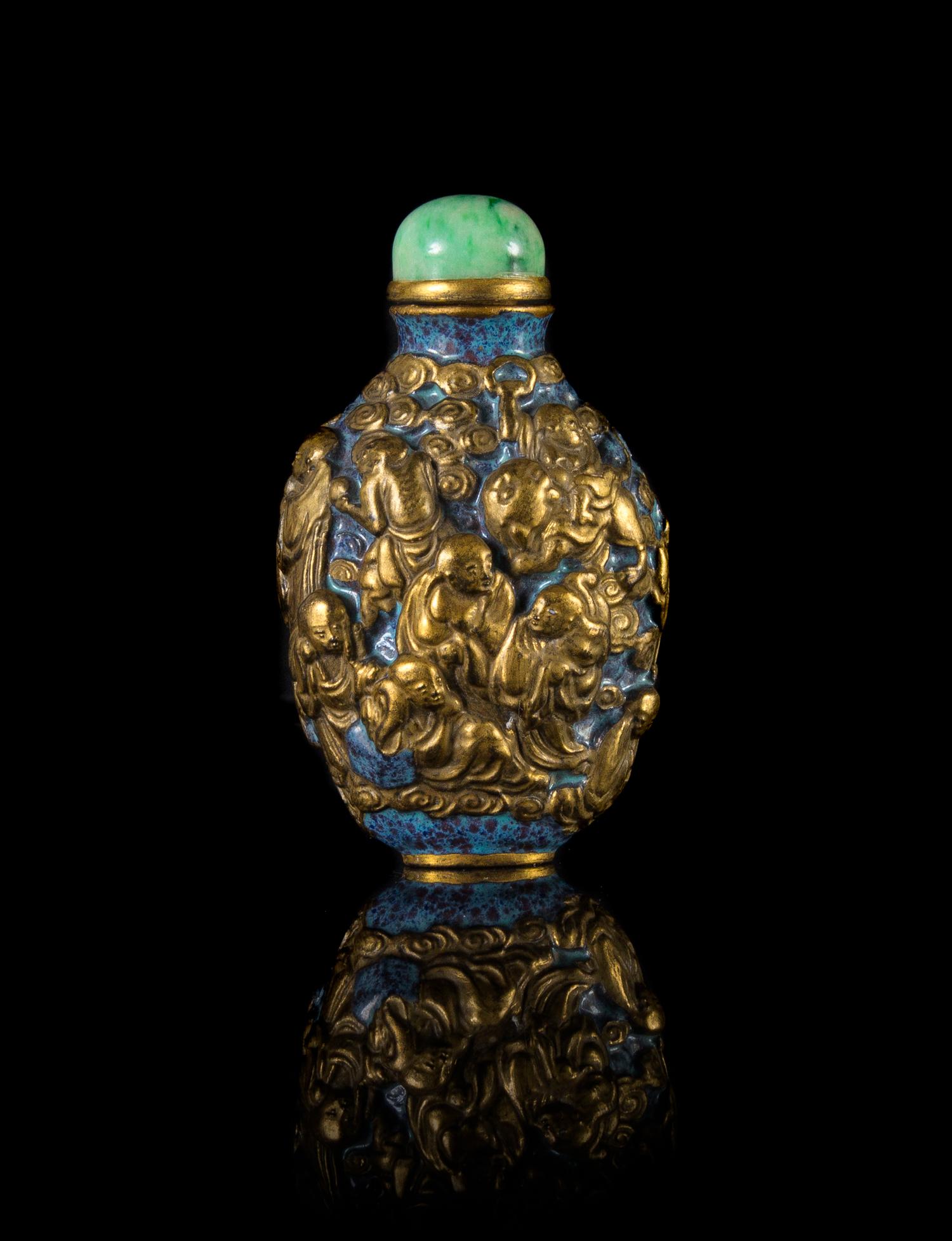 A Molded and Gilt Painted Porcelain Snuff Bottle — 19TH CENTURY