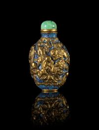 A Molded and Gilt Painted Porcelain Snuff Bottle — 19TH CENTURY