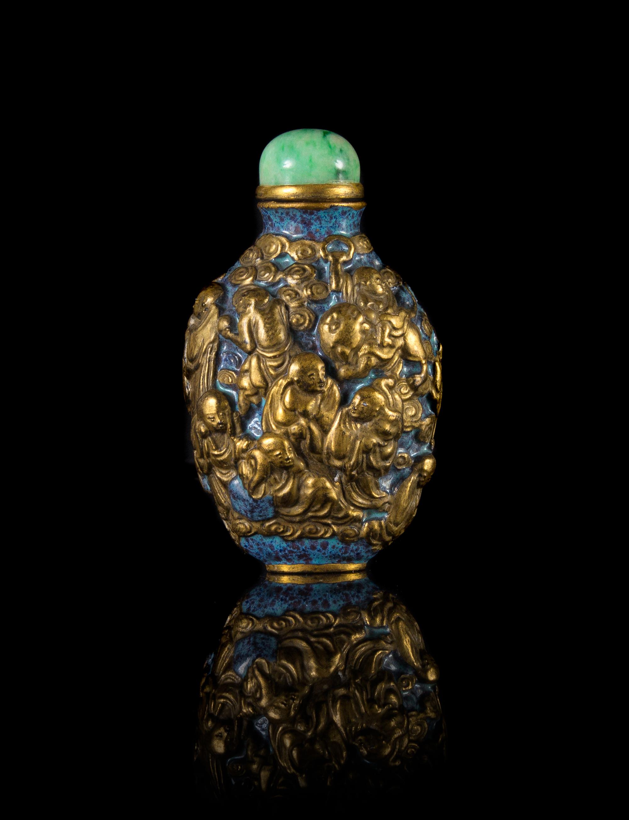 A Molded and Gilt Painted Porcelain Snuff Bottle — 19TH CENTURY