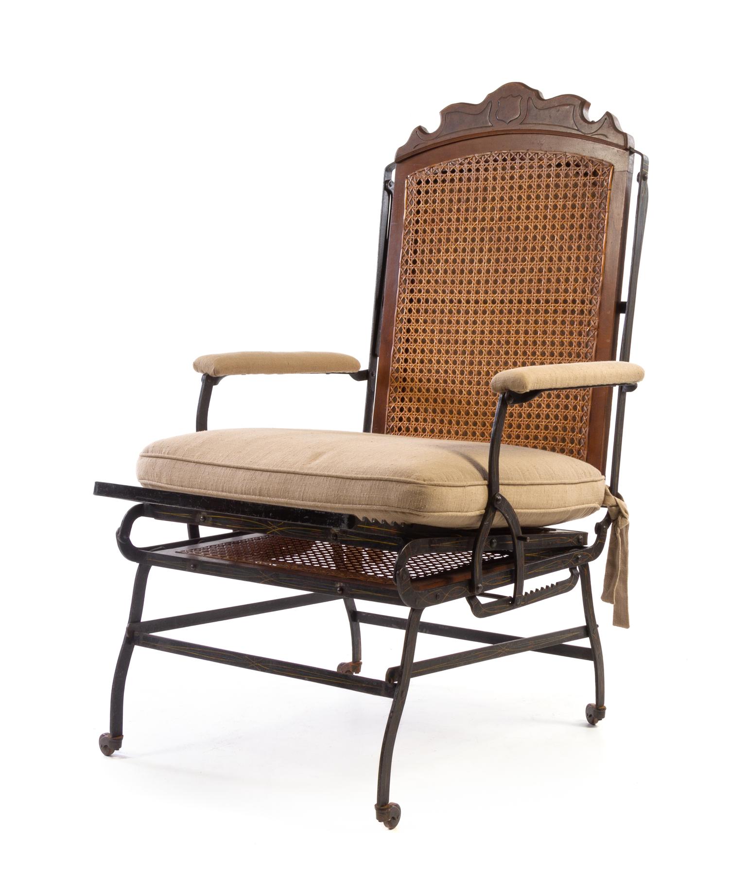 A Victorian Iron and Walnut Reclining Chair Height 46 1/8 inches. — LATE 19TH CENTURY