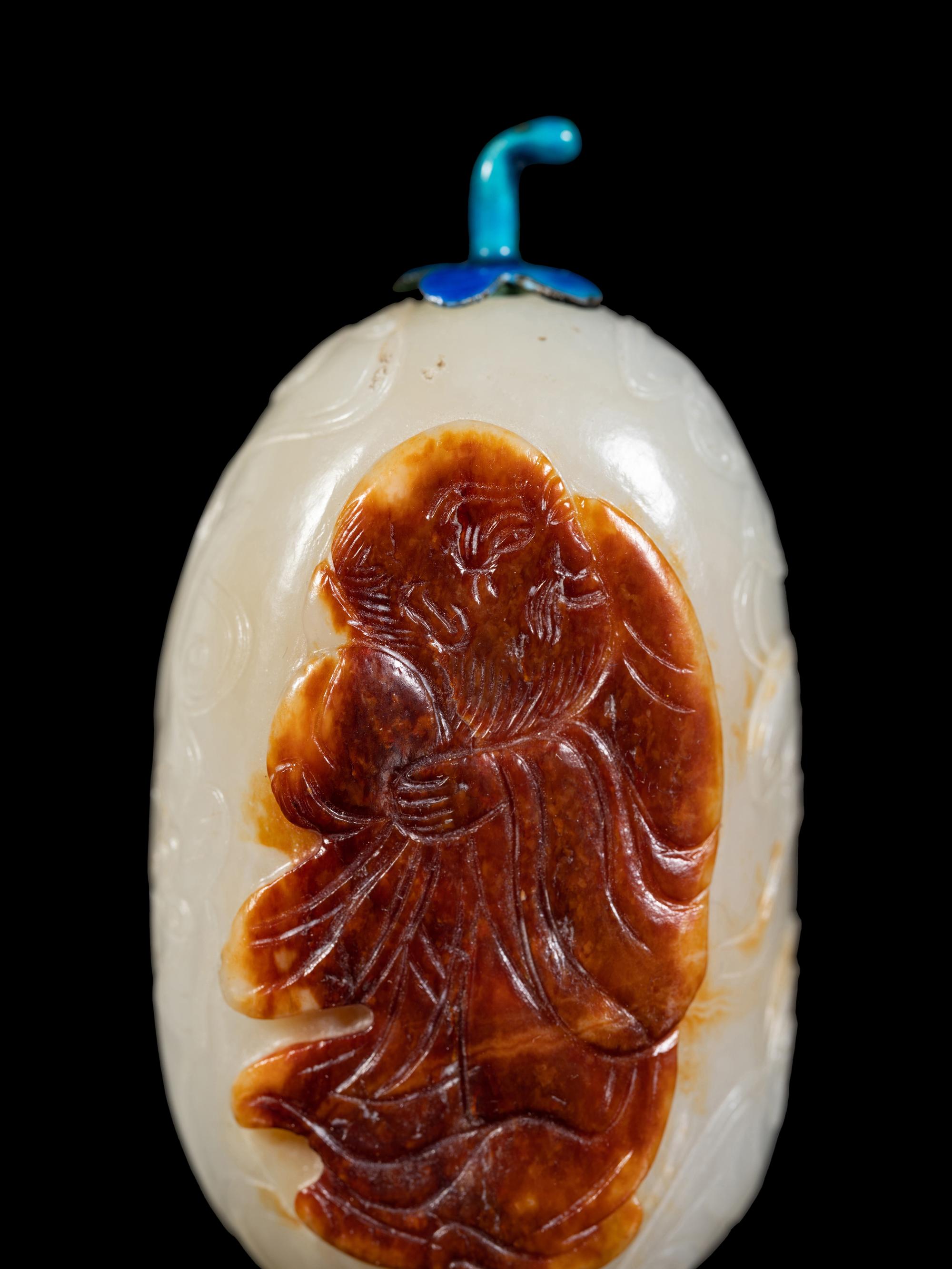 Two Carved Jade Snuff Bottles