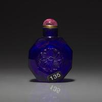 A Chinese Carved Cobalt Blue Glass Snuff Bottle, 18th Century 清中期 寶石藍料刻花鼻烟壺
