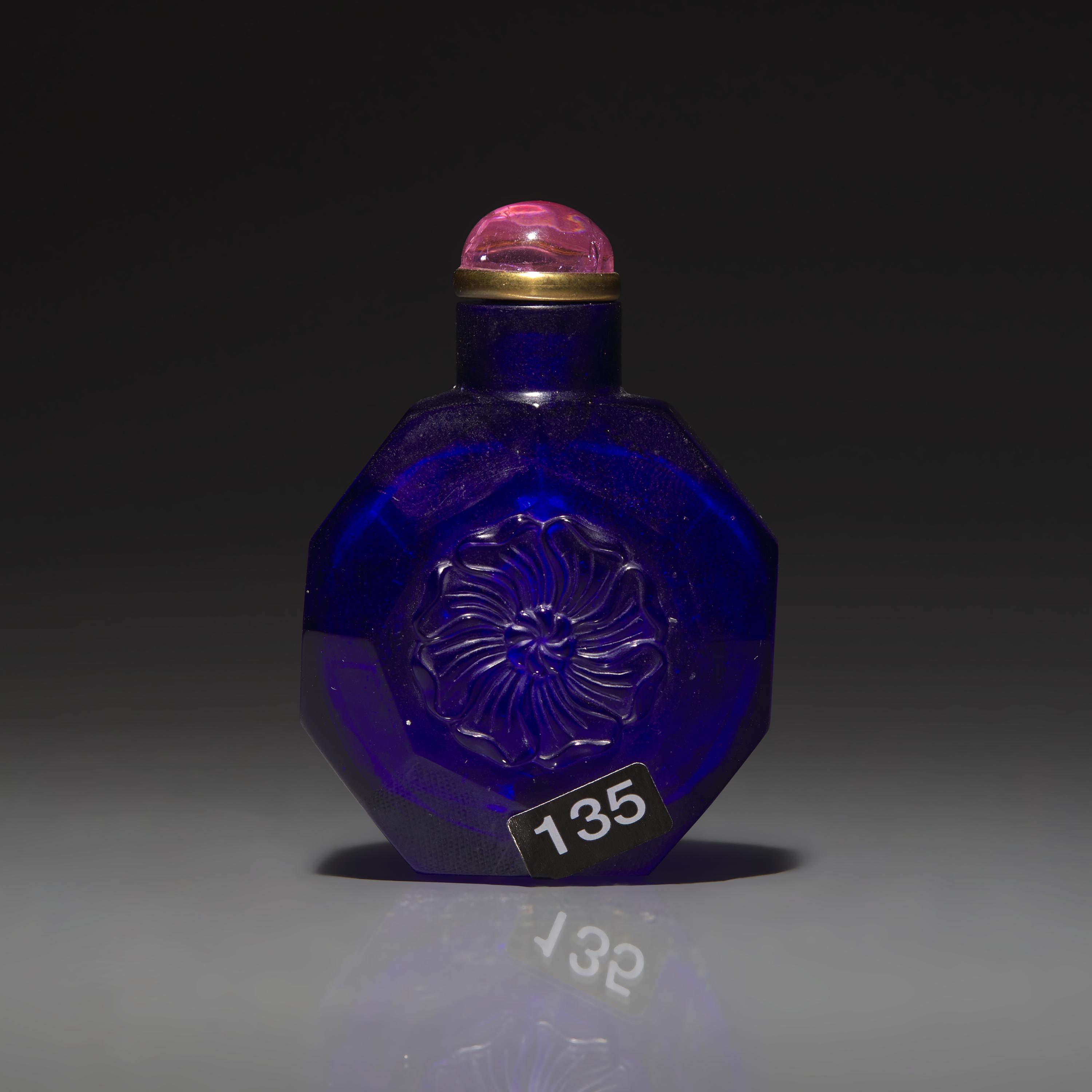 A Chinese Carved Cobalt Blue Glass Snuff Bottle, 18th Century 清中期 寶石藍料刻花鼻烟壺
