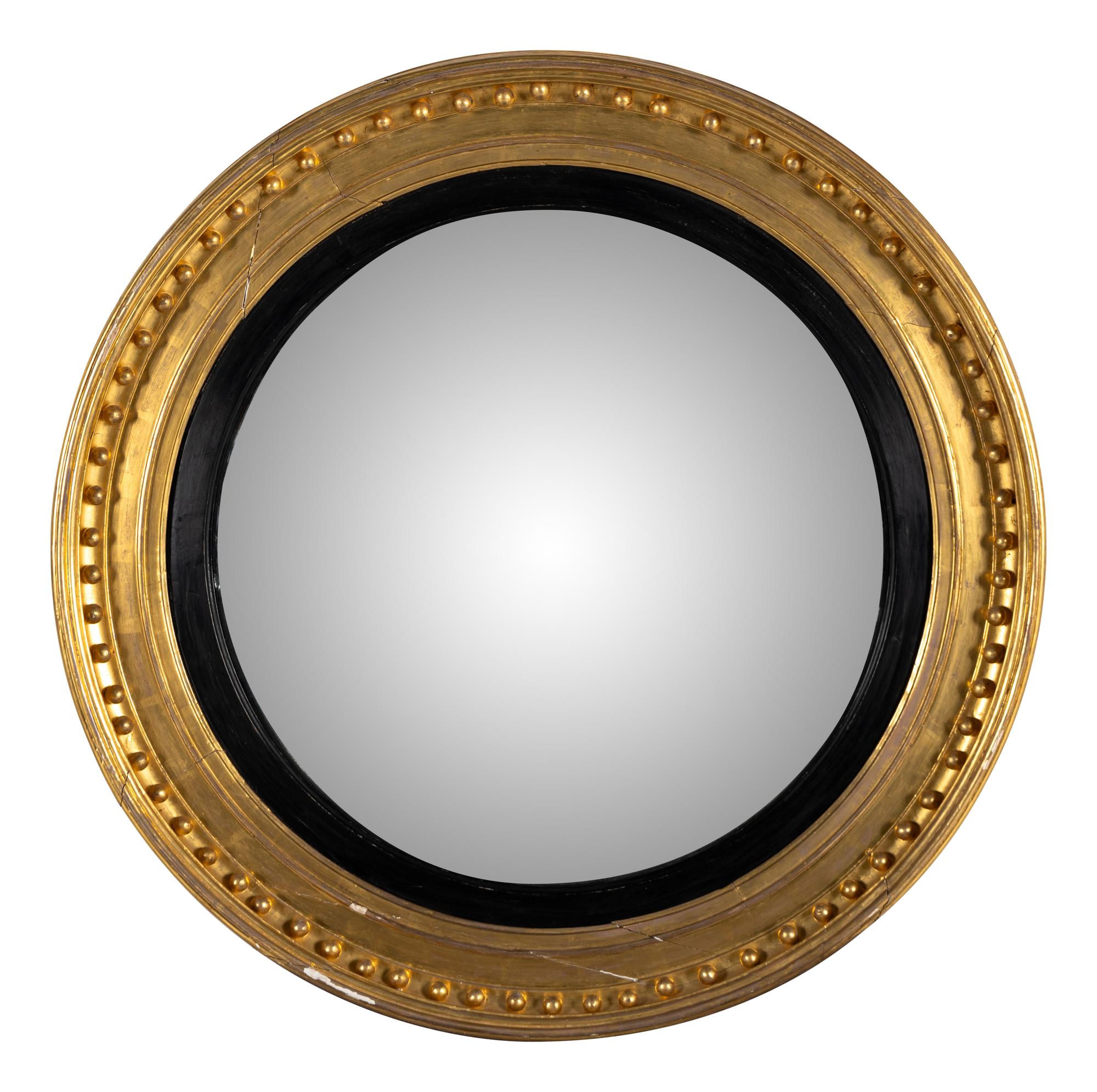 A Regency Style Gilt Gesso Bull's-Eye Mirror