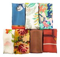 Seven Designer Scarves: Two Gucci, One Jean Paul Gaultier, Two Must de Cartier, One Hermès, One Christian Dior