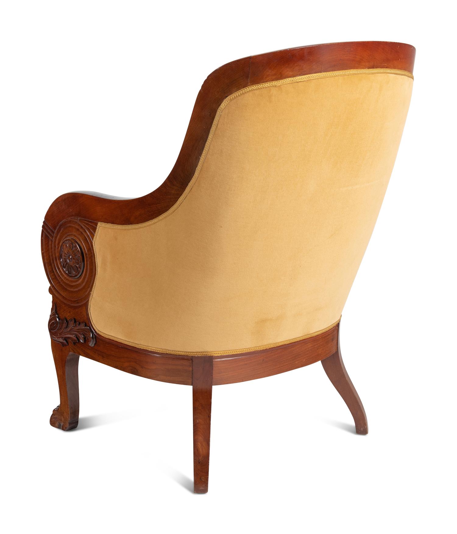 A Pair of Baltic Style Carved Walnut Bergères