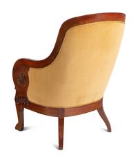 A Pair of Baltic Style Carved Walnut Bergères