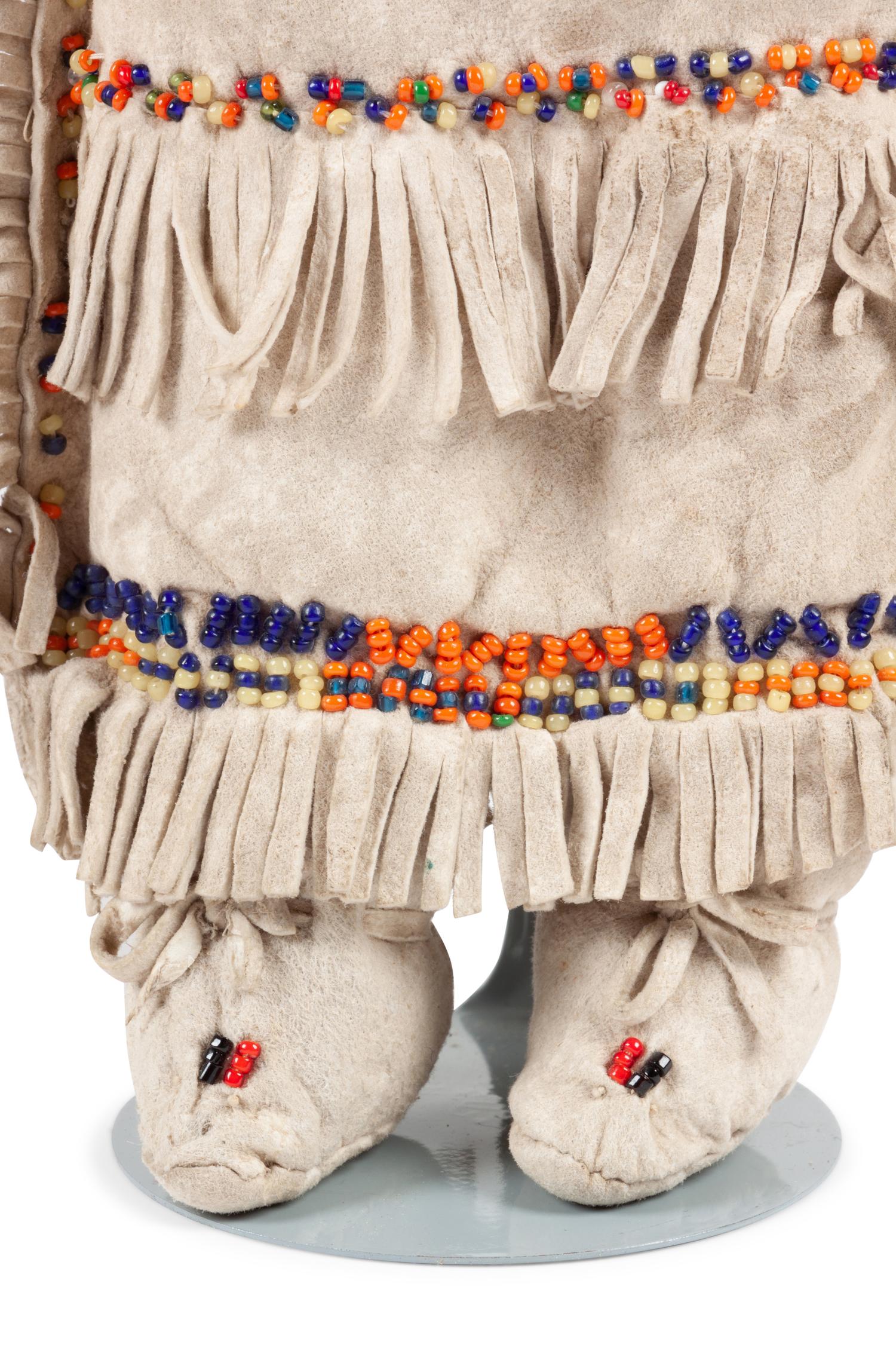 Apache and Plains Beaded Hide Dolls