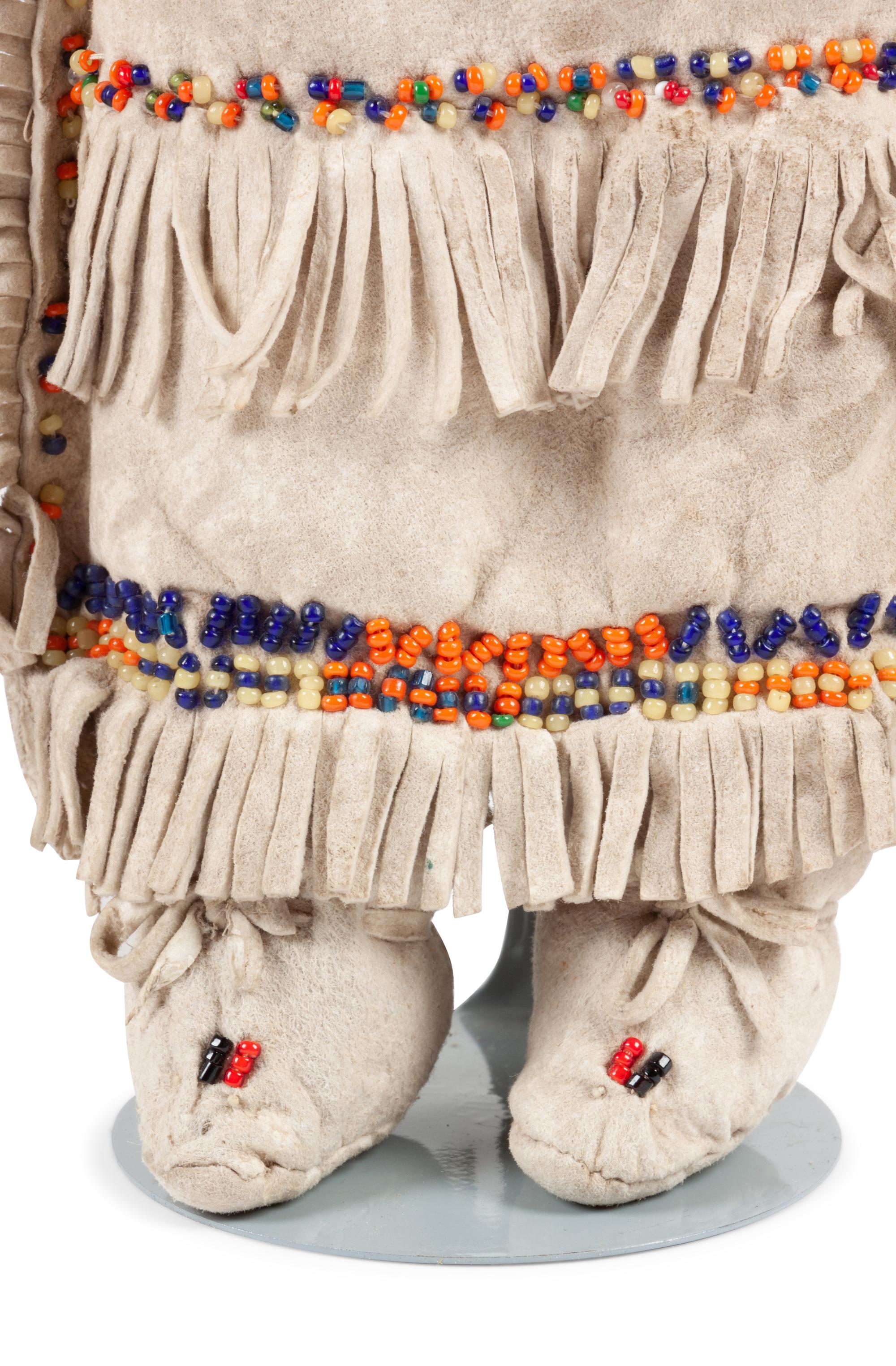 Apache and Plains Beaded Hide Dolls