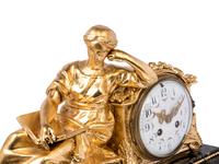 A French Gilt Bronze and Marble Figural Mantel Clock