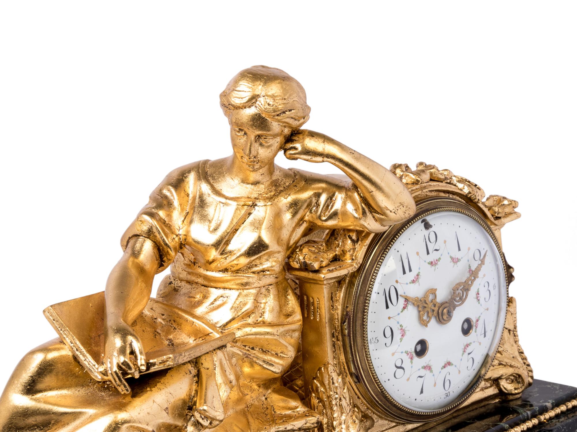A French Gilt Bronze and Marble Figural Mantel Clock