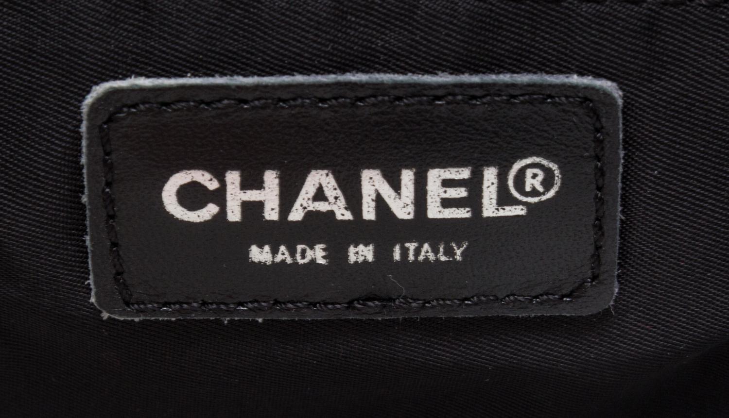 A Chanel Black Neoprene Cross Body Bag, 11" x 9.5" X 4".