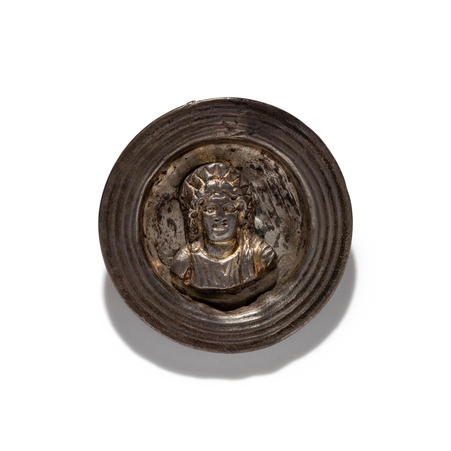 A Roman Gilt-Silver Bezel with the God Helios