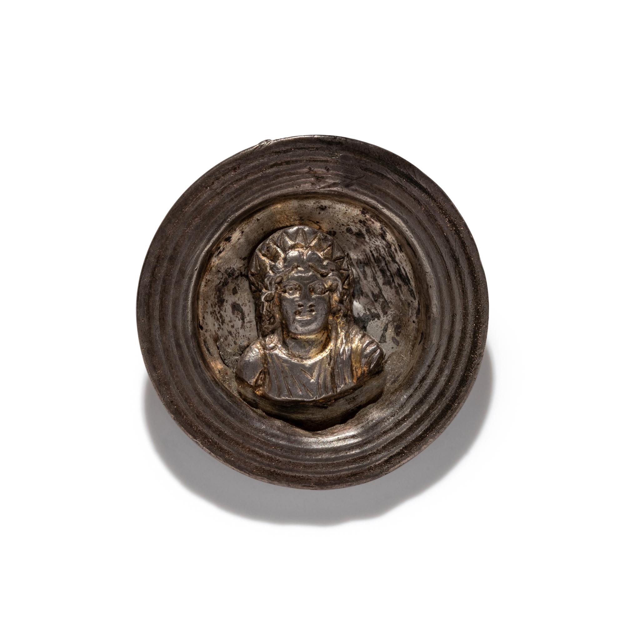A Roman Gilt-Silver Bezel with the God Helios