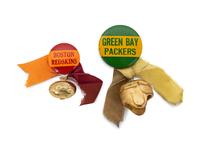 A Group of Vintage Green Bay Packers and Boston Redskins Pinback Buttons from the 1936 NFL Championship Game