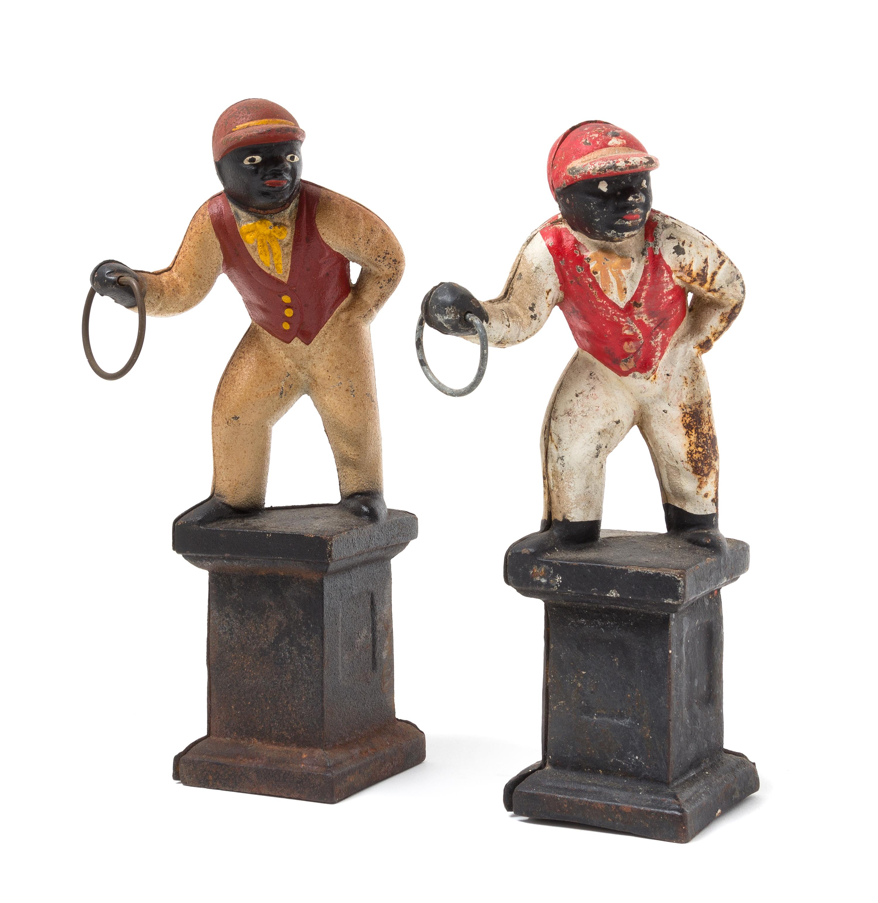 Two Victorian Cast Iron Doorstops Height 11 1/2 inches.