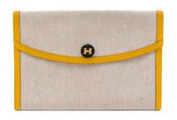 An Hermes Cream Toile and Yellow Leather Rio Clutch, 8.5" x 6" x 1.5".
