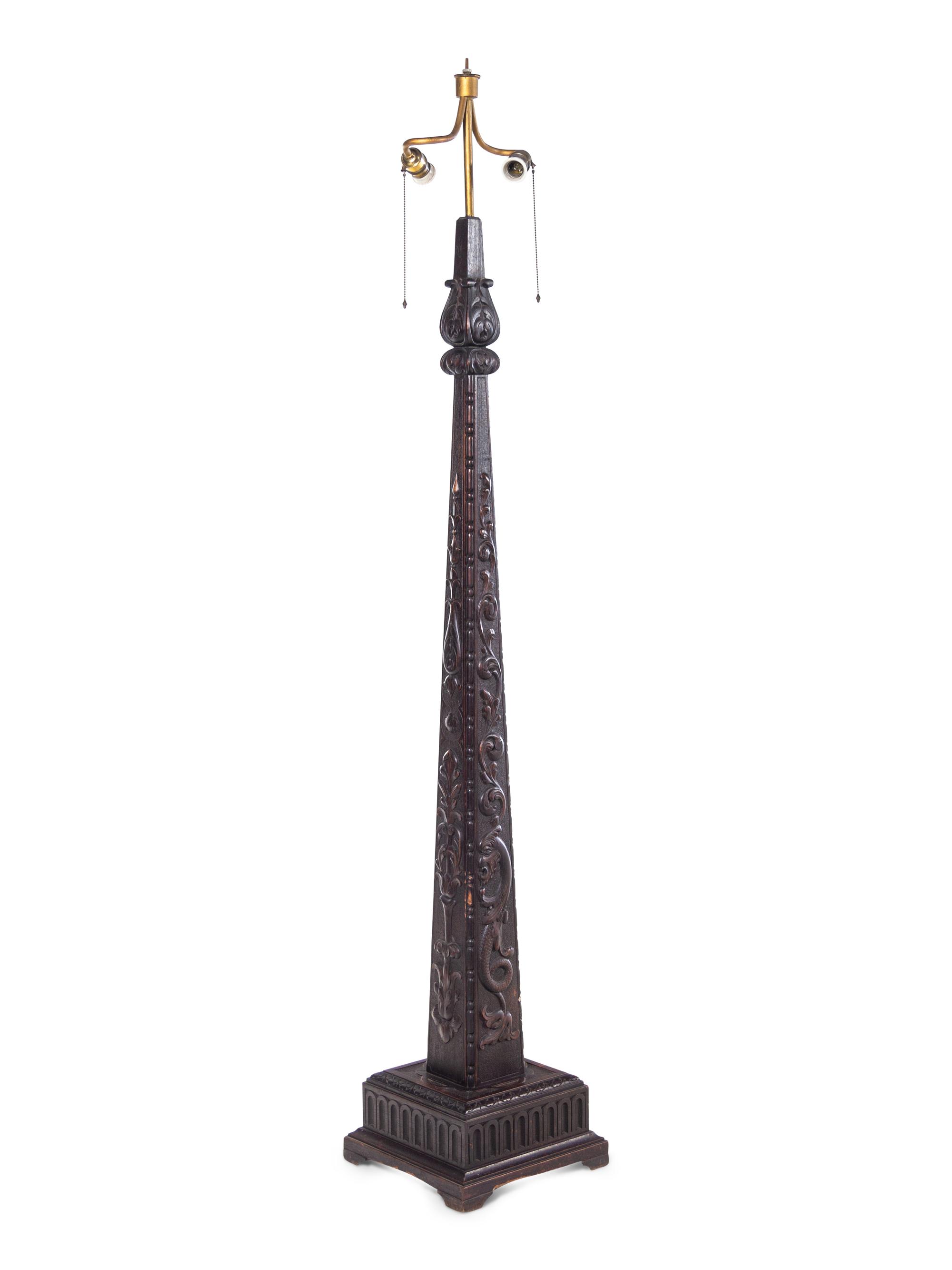 A Carved Mahogany Floor Lamp
