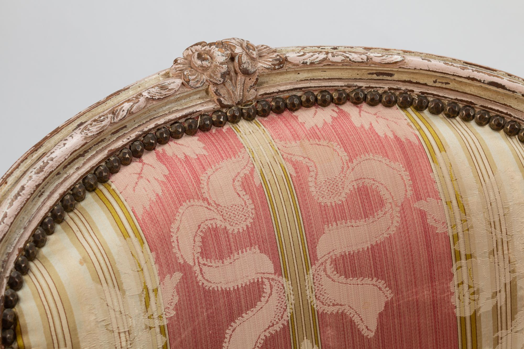 A Pair of Louis XV Silk-Upholstered and Painted Bergeres