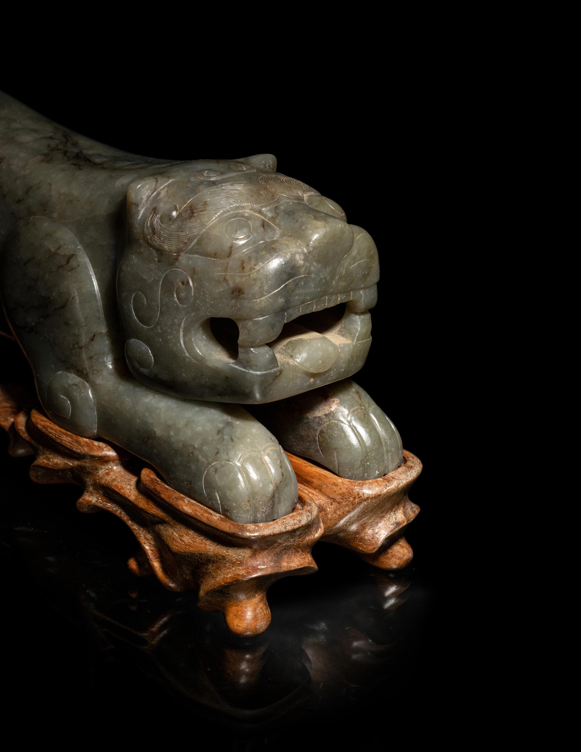 Two Chinese Mottled Jade Figures of Beasts