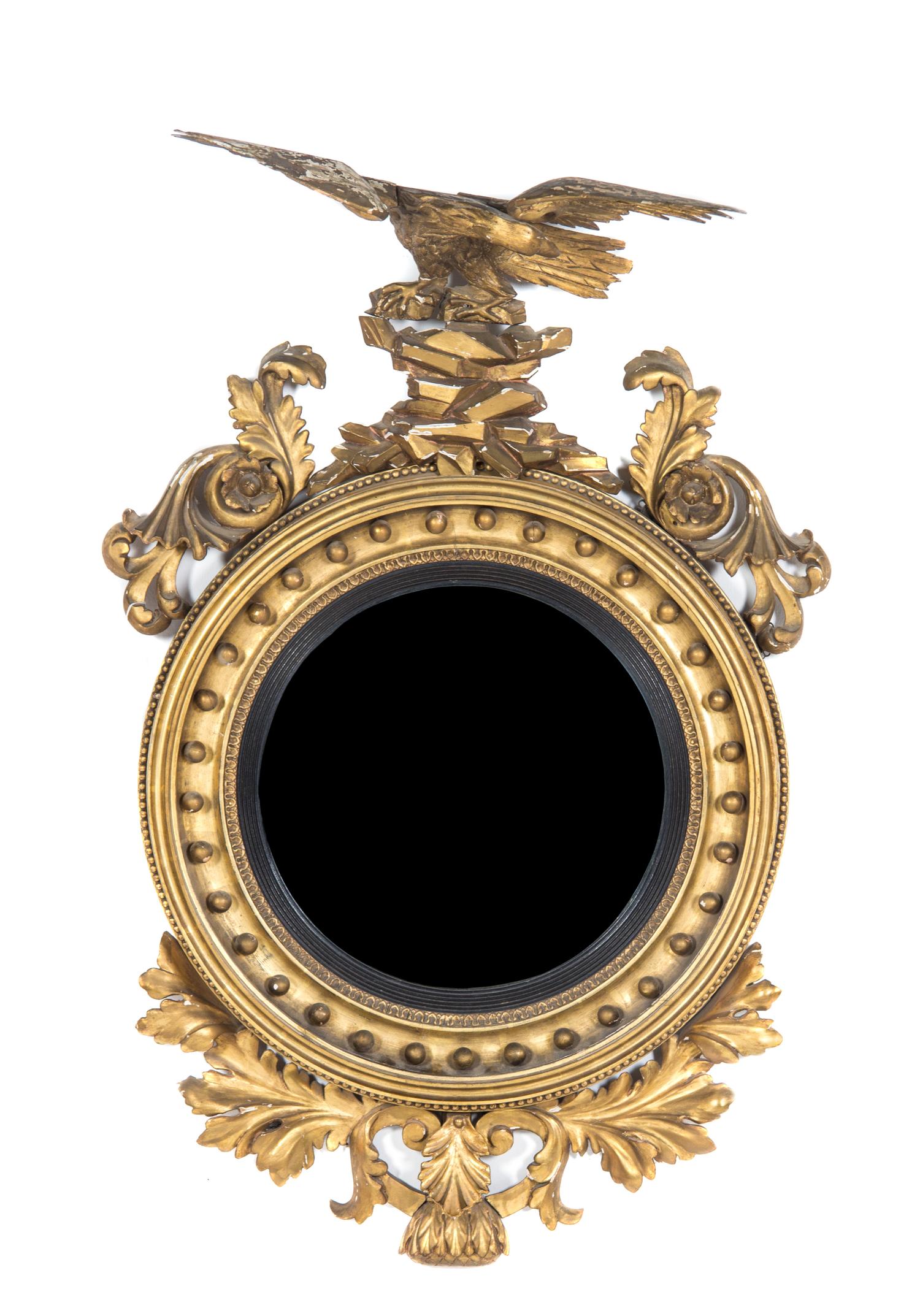 A Federal Giltwood Bull's Eye Mirror, Height 48 x width 32 inches.