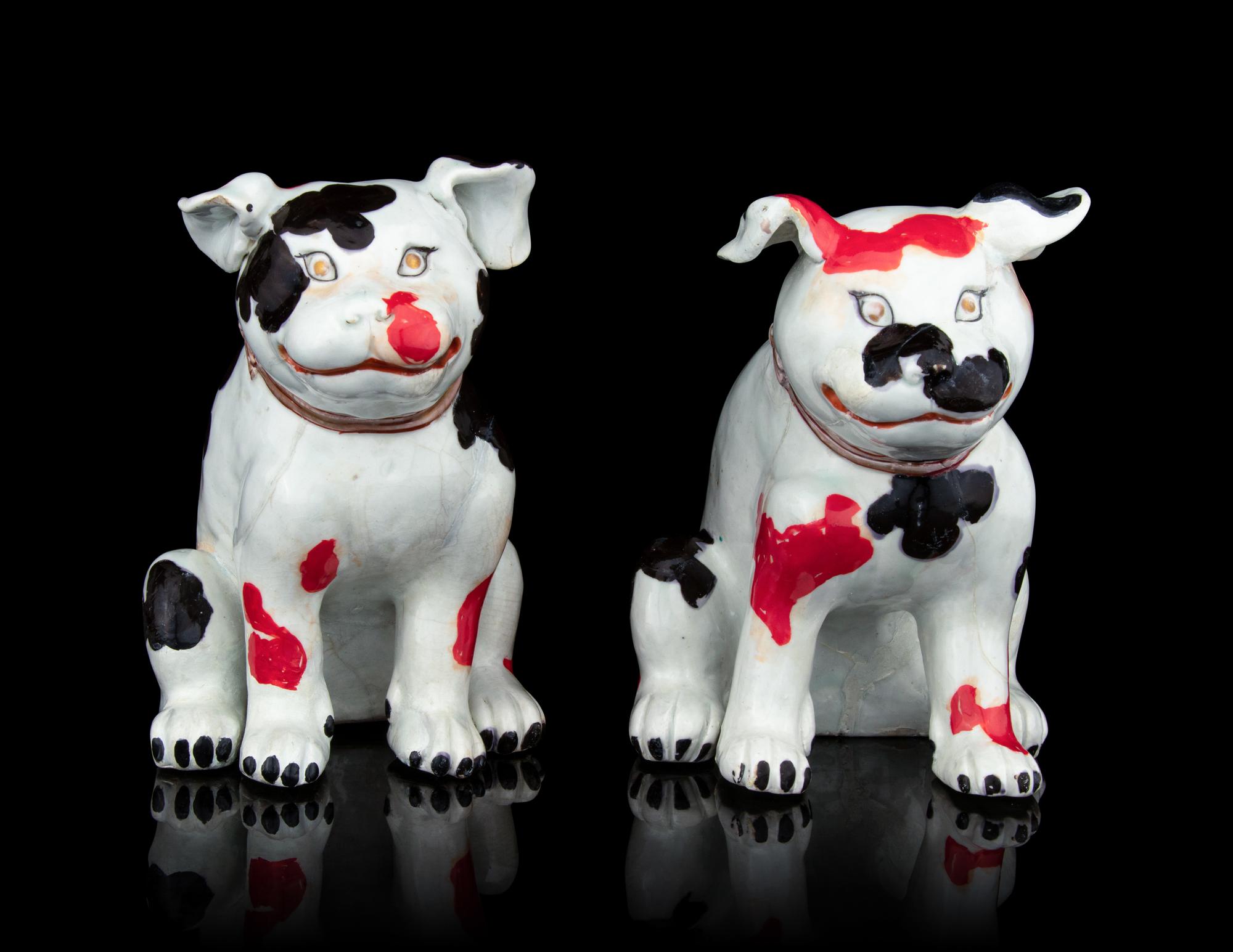 A Pair of Japanese Arita Figures of Puppies