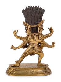 A Small Tibetan Gilt Bronze Figure of Rakta Yamari