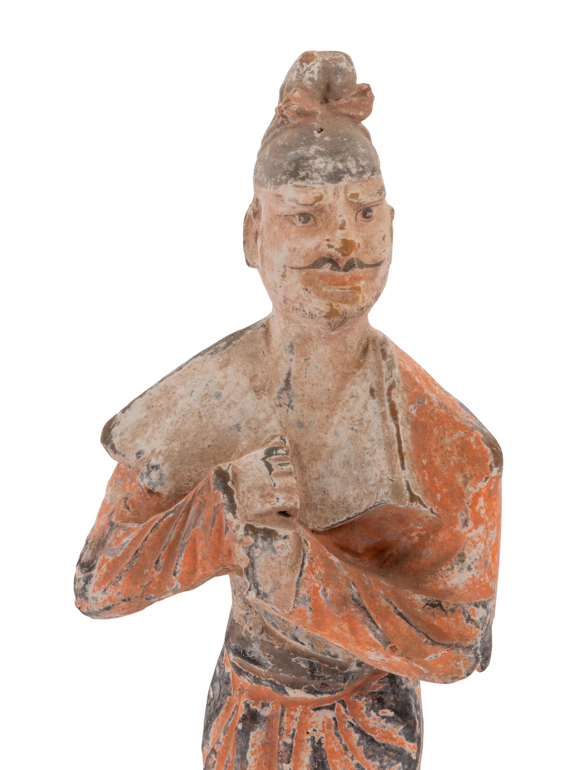A Chinese Painted Pottery Figure of a Foreign Groom