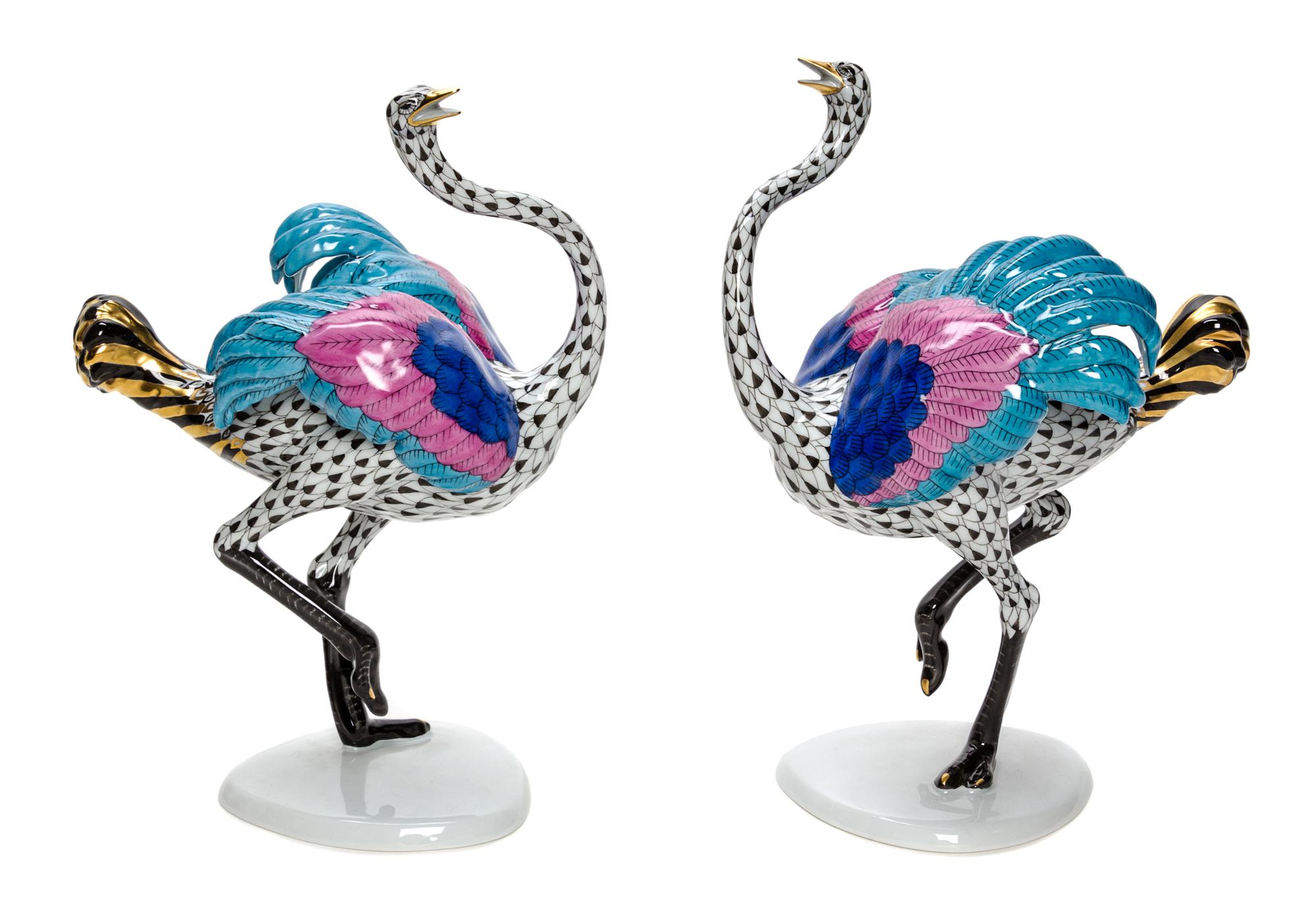 A Pair of Herend Porcelain Figures Height 10 inches.