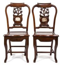 A Pair of Chinese Carved Hardwood Side Chairs Height 36 1/2 x width 16 1/4 x depth 16 1/2 inches. — 20TH CENTURY