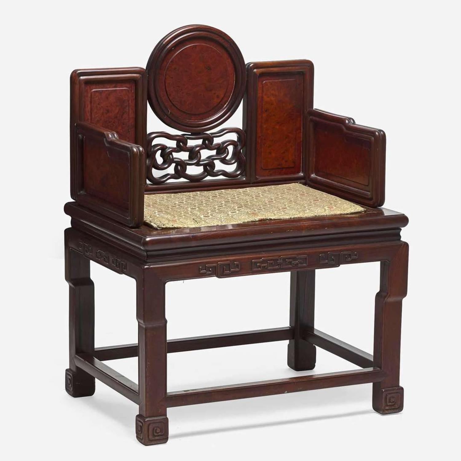 A Chinese carved hardwood and huamu armchair 硬木搭红木扶手椅一件 Late 19th/20th century ??????????