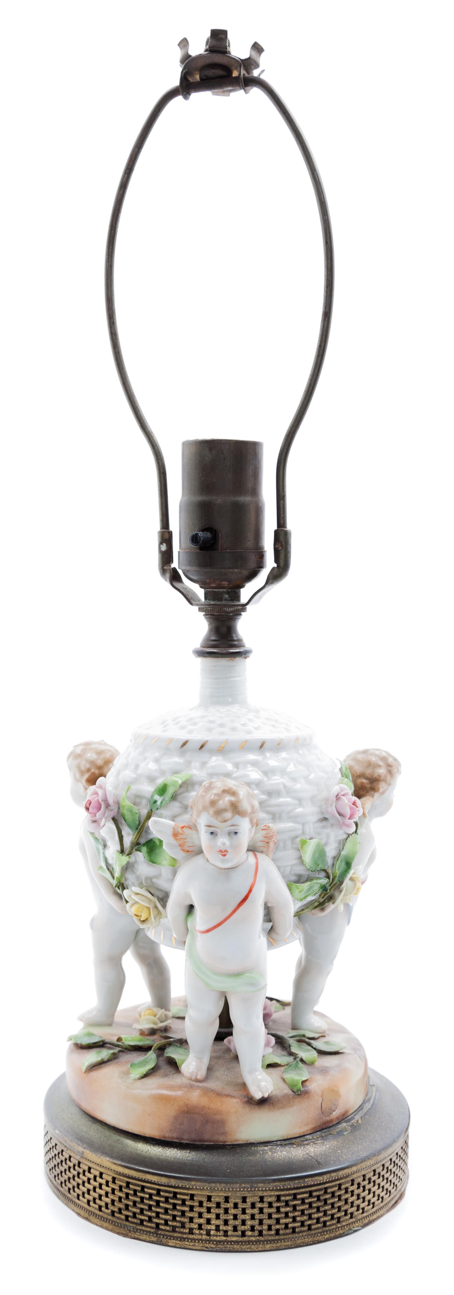 A Figural Table Lamp Height 17 inches.