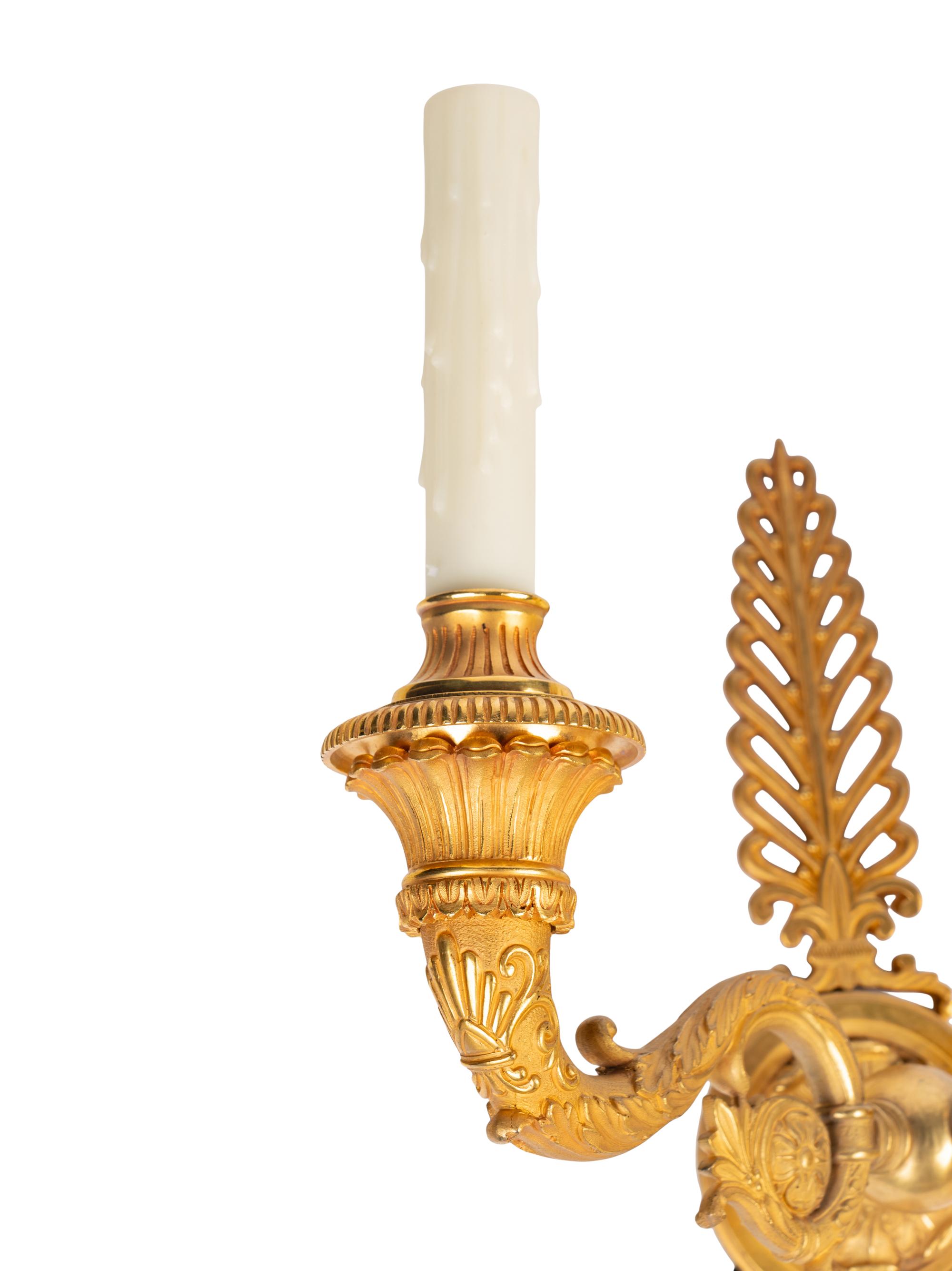 A Pair of French Gilt Bronze Two-Light Wall Sconces