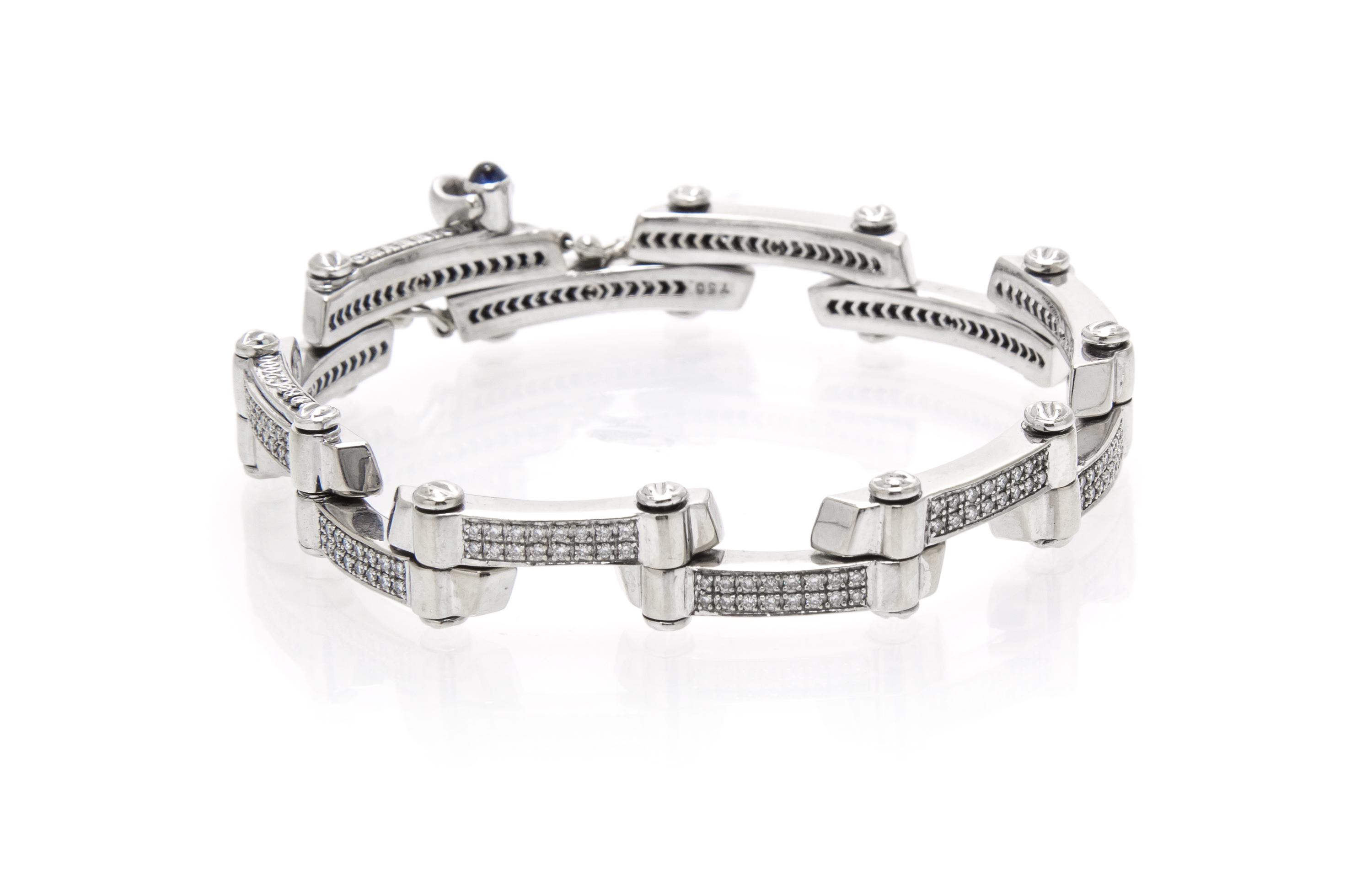 An 18 Karat White Gold, Diamond and Sapphire Bracelet, Charriol, 25.30 dwts.