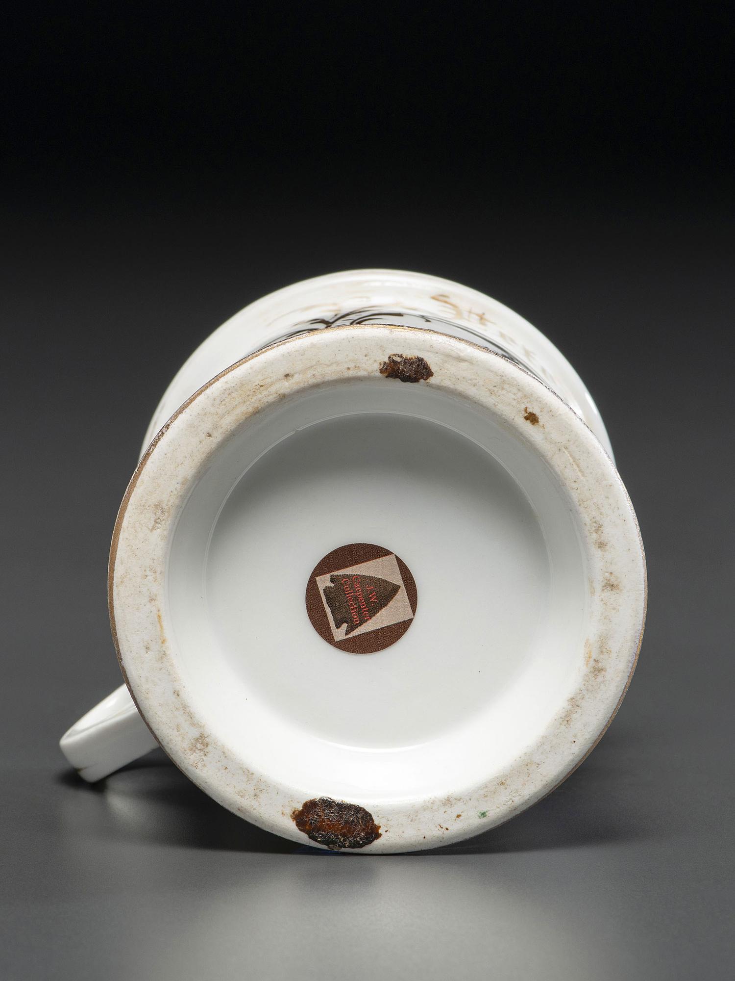 A Porcelain Shaving Mug Depicting a Steam Roller