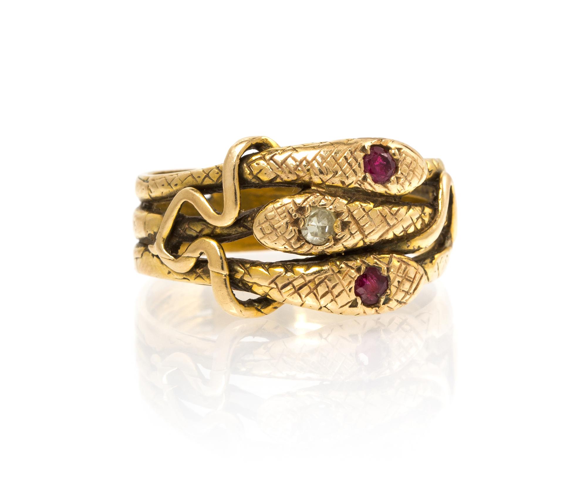 A Yellow Gold, Ruby and Diamond Snake Ring, 4.80 dwts.