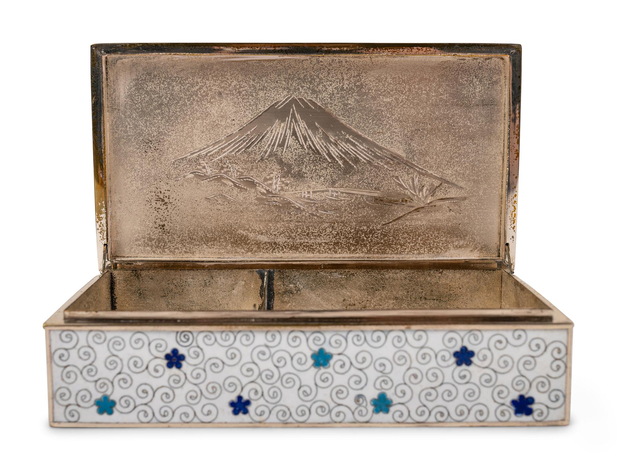 Eight Japanese Cream Ground Cloissoné Enamel Vessels