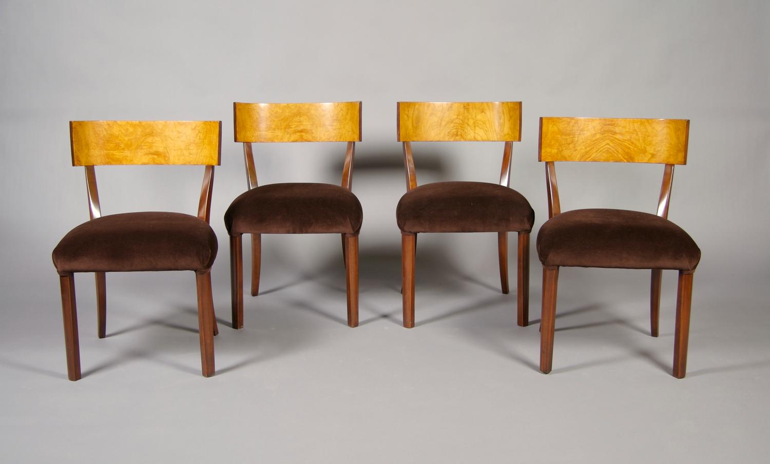 A Set of Four Swedish Birch and Walnut Klismos Chairs, Height 30 1/2 inches.