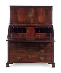 A George III Carved Mahogany Slant-Front Secretary Desk in the Chippendale Taste