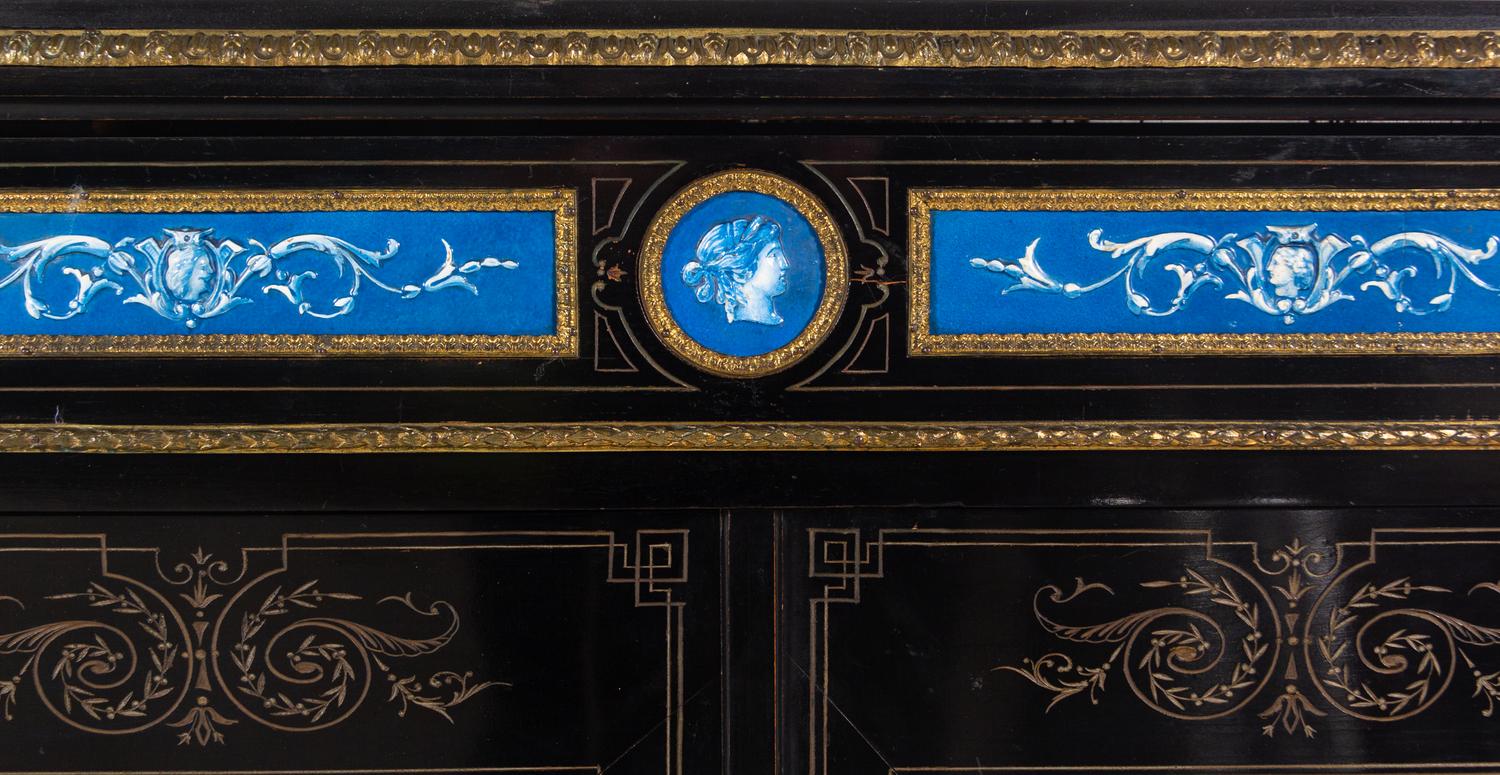 A Napoleon III Ebonized and Glazed Pottery Plaque-Mounted Marble-Top Meuble d'Appui