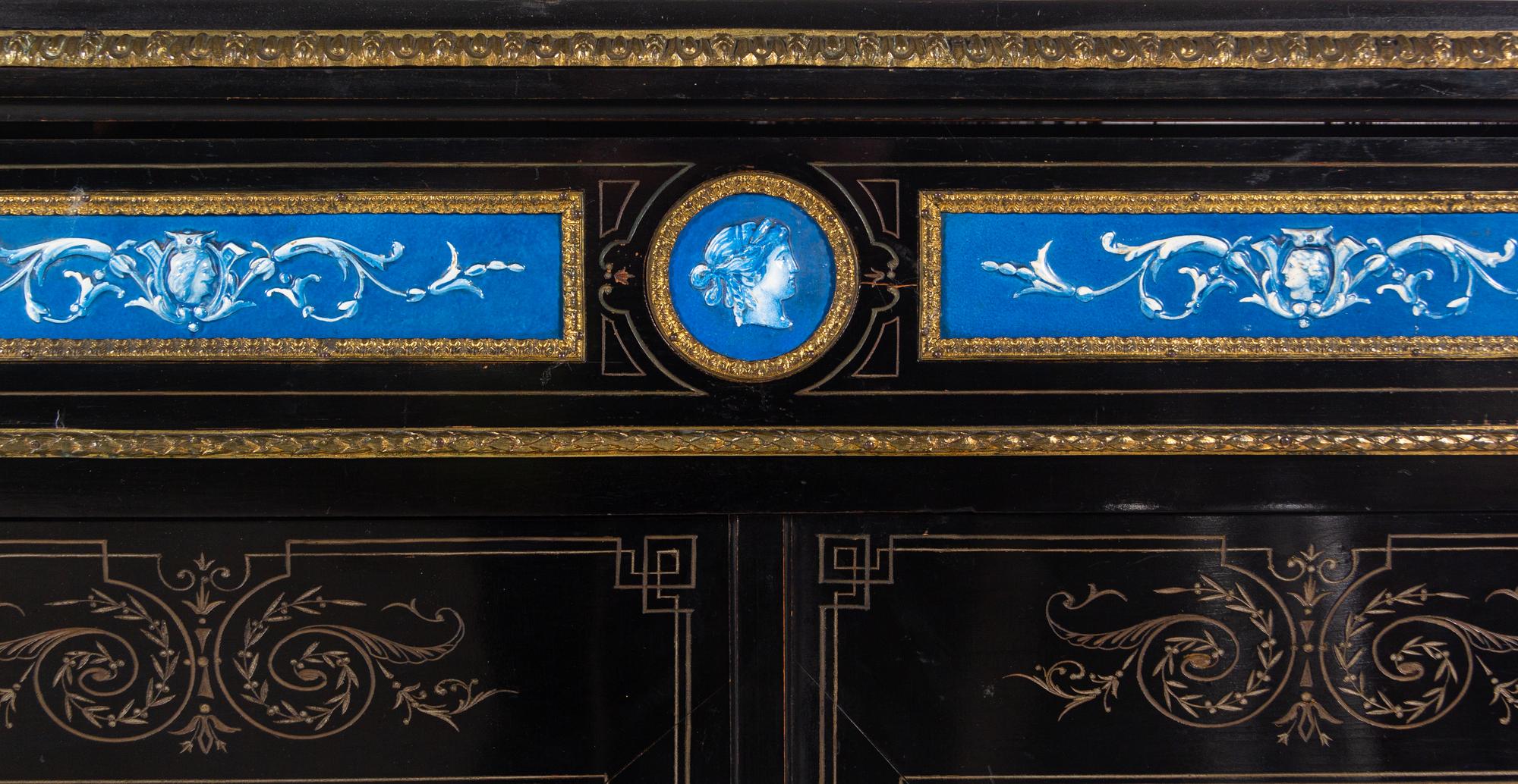 A Napoleon III Ebonized and Glazed Pottery Plaque-Mounted Marble-Top Meuble d'Appui
