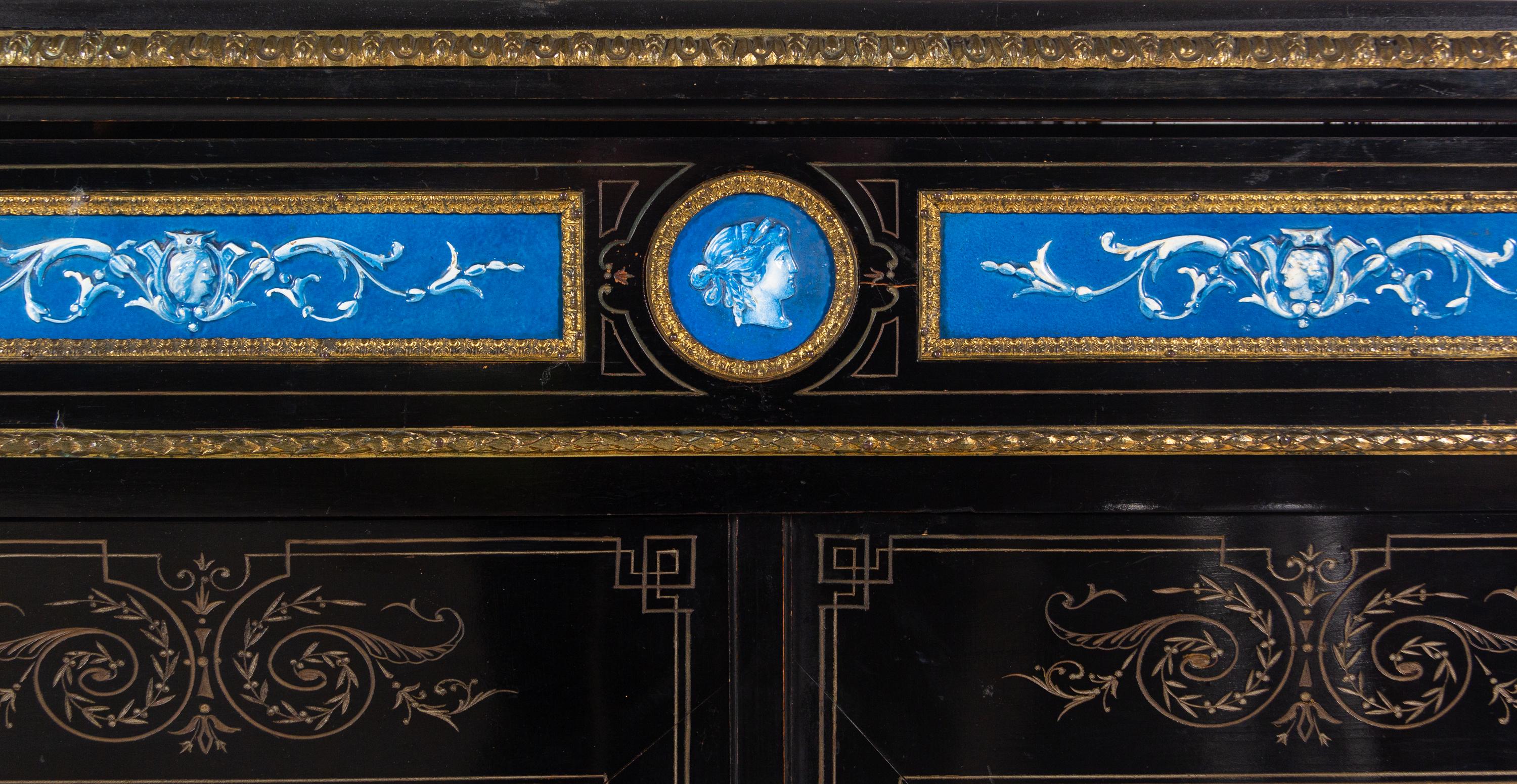 A Napoleon III Ebonized and Glazed Pottery Plaque-Mounted Marble-Top Meuble d'Appui