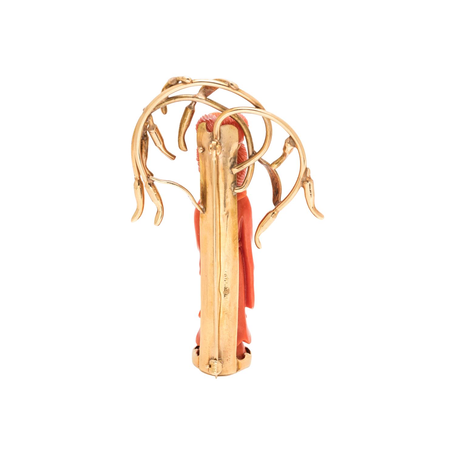 YELLOW GOLD AND CARVED CORAL BROOCH