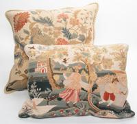 Two Needlepoint Pillows Width of widest 22 inches. — 20TH CENTURY