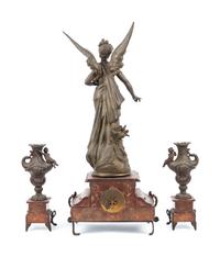 A French Cast Metal and Marble Clock Garniture