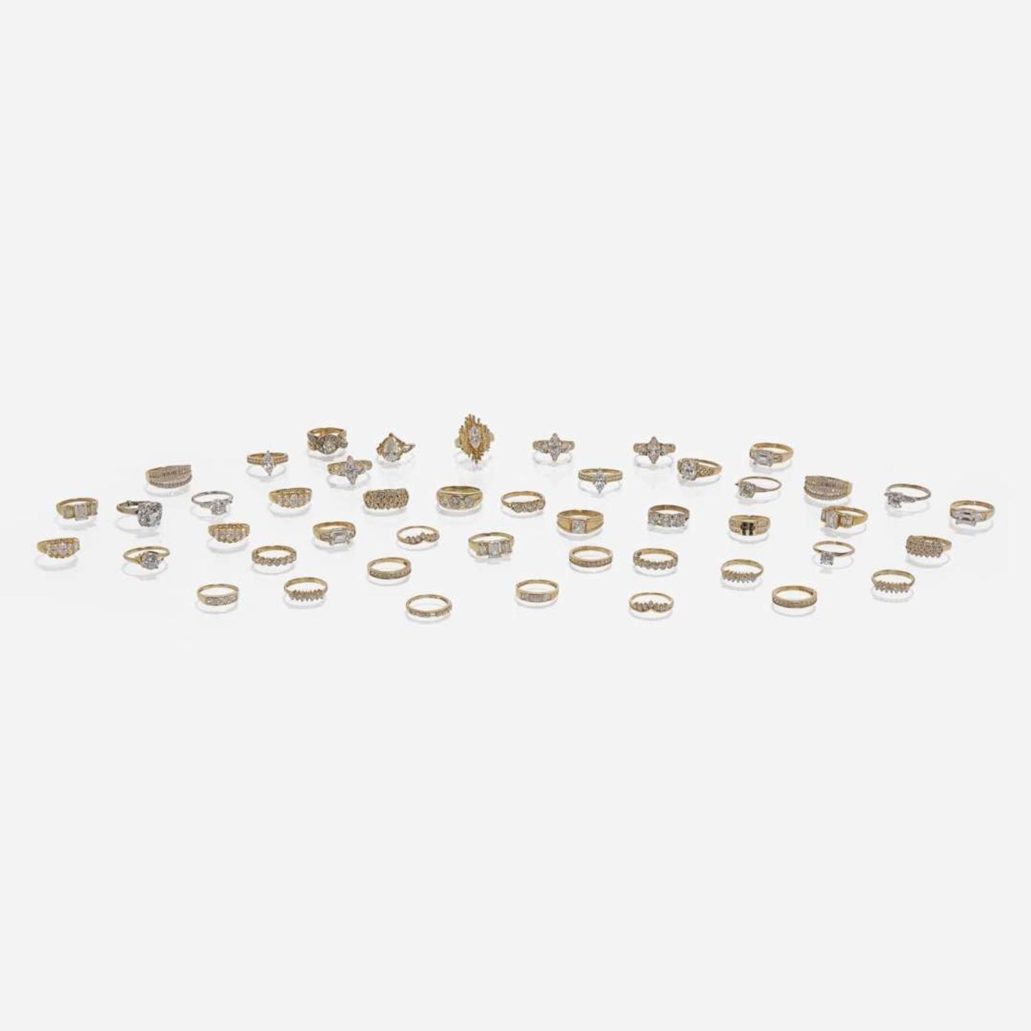 Large Collection of 14K Gold and Colorless Stone Rings