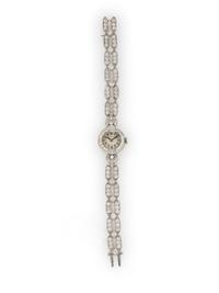 TIFFANY & CO., ANTIQUE, DIAMOND AND PLATINUM WATCH