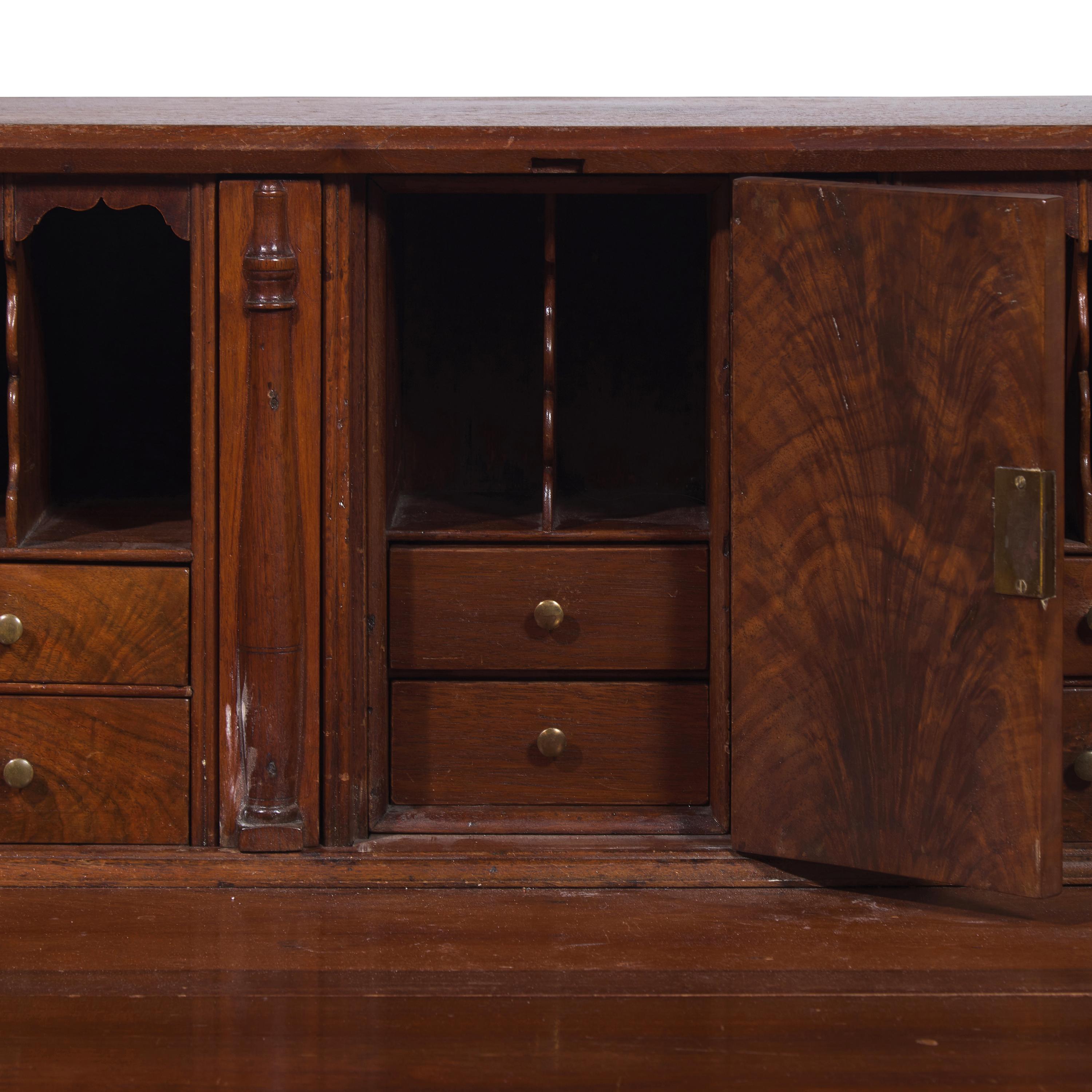 A Chippendale Walnut Slant-Front Desk