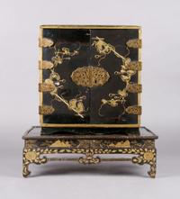 A Chinese Black Lacquered Diminutive Cabinet on Stand, Height 15 3/4 inches.